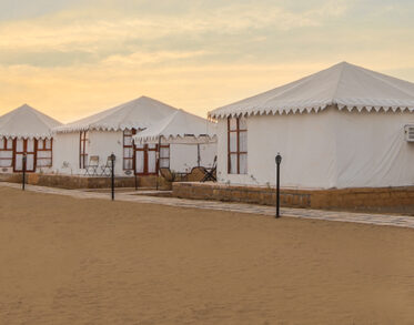 Wake up to golden sunrises in beautifully crafted, luxurious tents nestled deep within the pristine sands