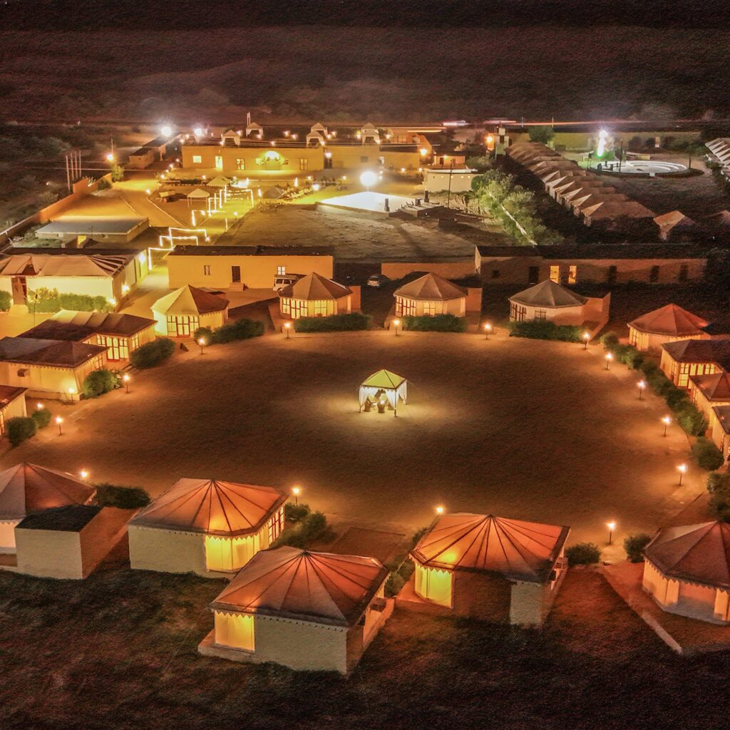 Aerial view of Suryaansh Desert Wellness Resort, a luxury camp in Jaisalmer featuring luxury tents near the Sam Sand Dunes.